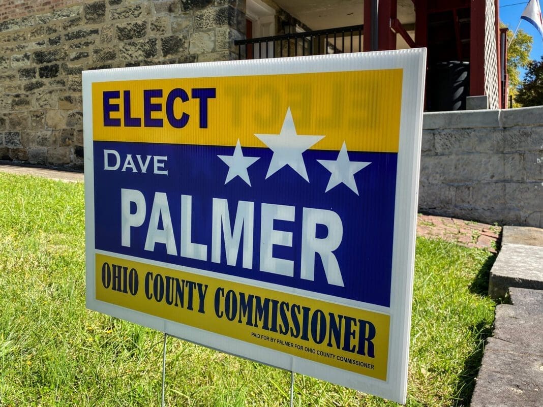 A campaign sign in a yard.