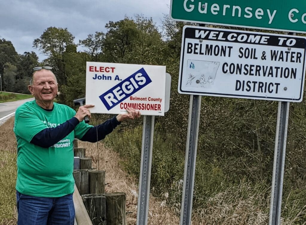 A guy with a political sign.