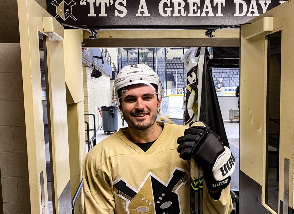 A hockey player in his gear.