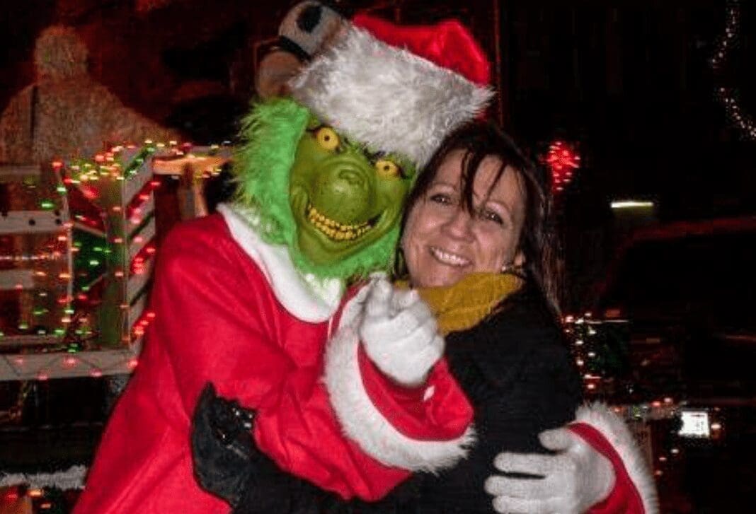 A lady and a guy in a costume.