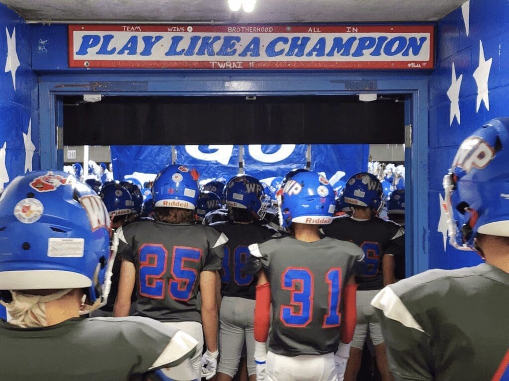 A team walking through a tunnel.