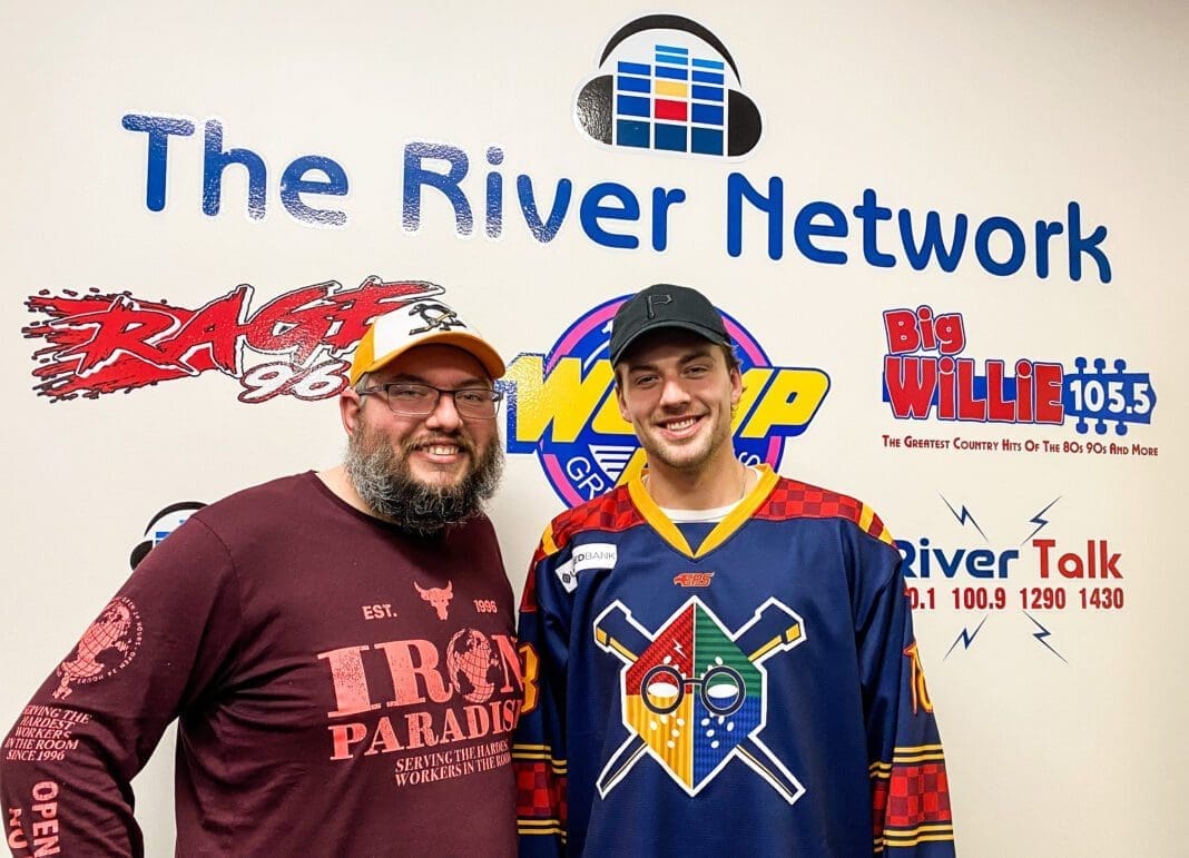 Two men posing for a photo.