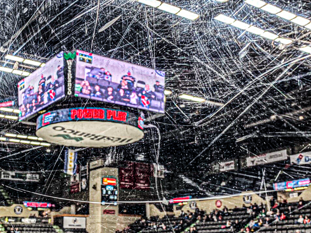 The glass of a rink.