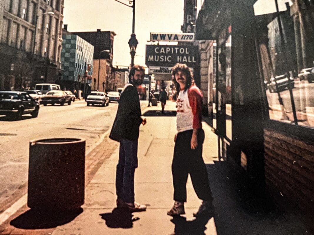 Two guys on a street.