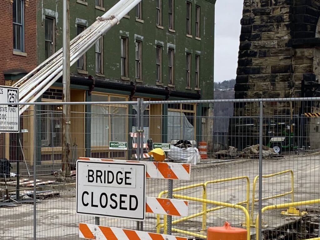 A fence blocking a road.