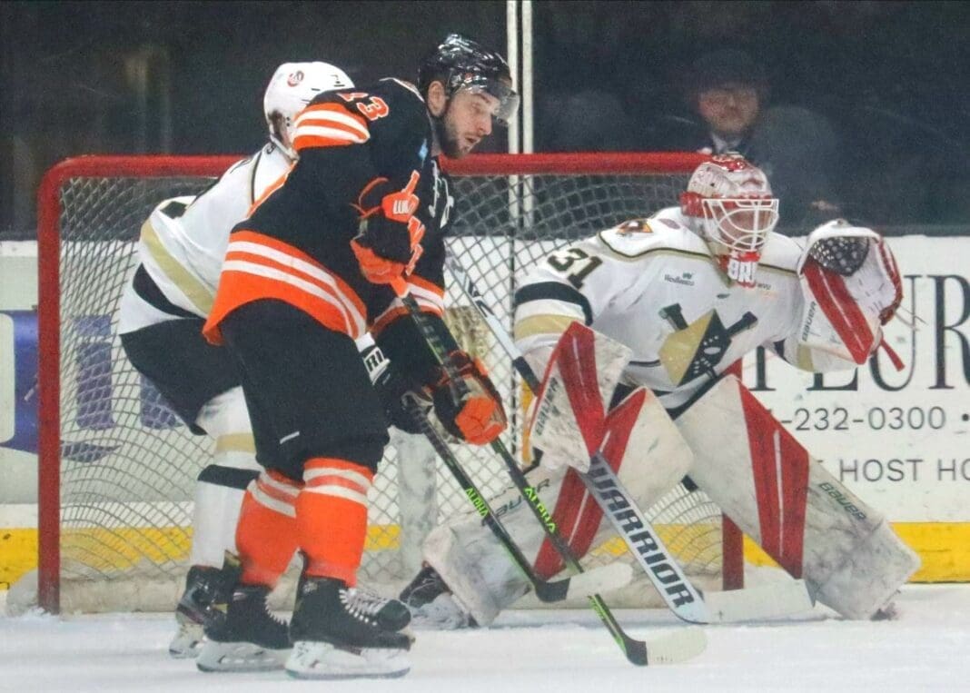 Two teams playing hockey.