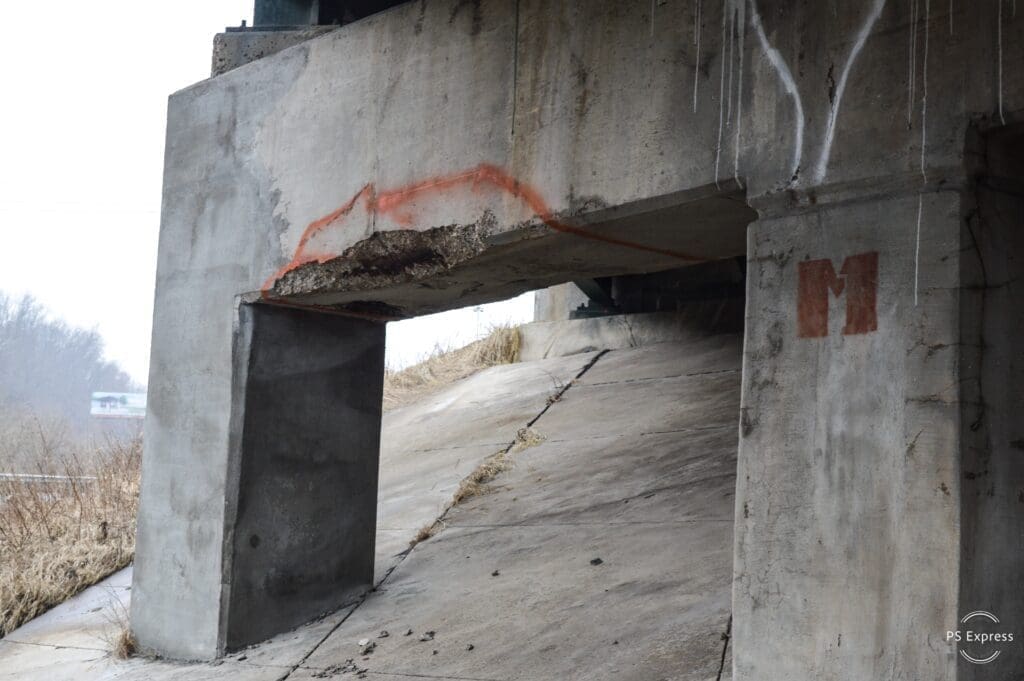 A junk of cement has fallen from the pier.