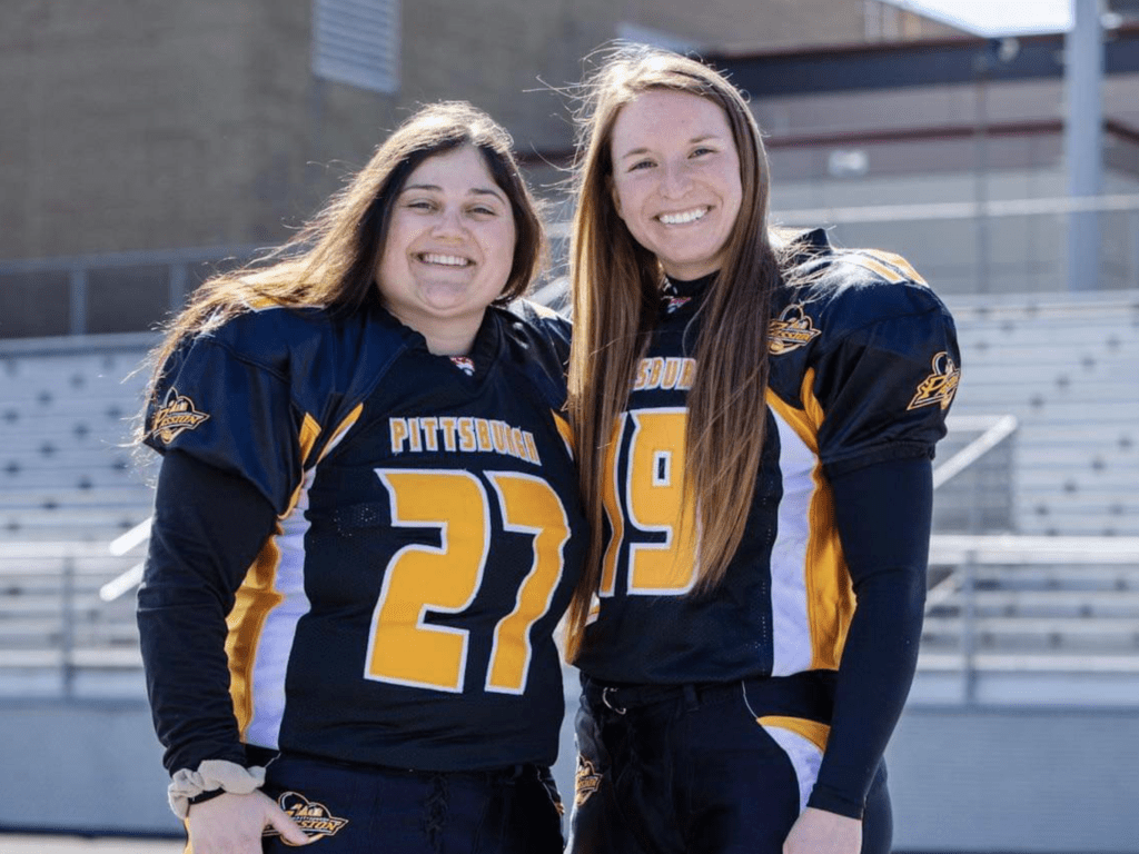 Two female football players.