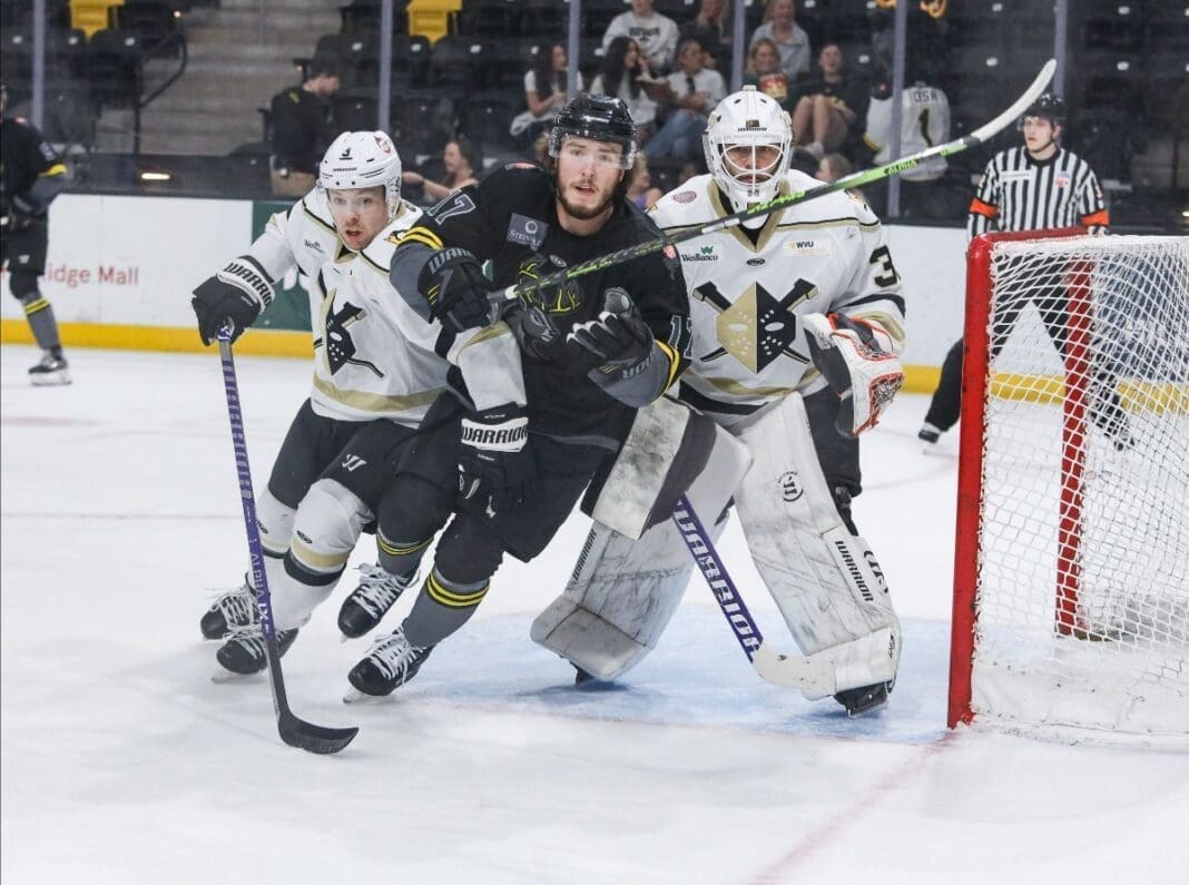 Hockey players on ice.