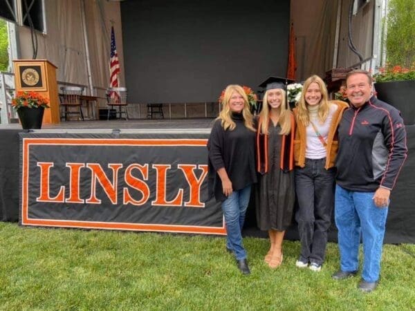 A family near a stage.