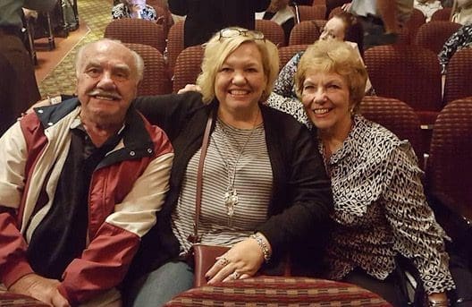 A daughter and her parents.