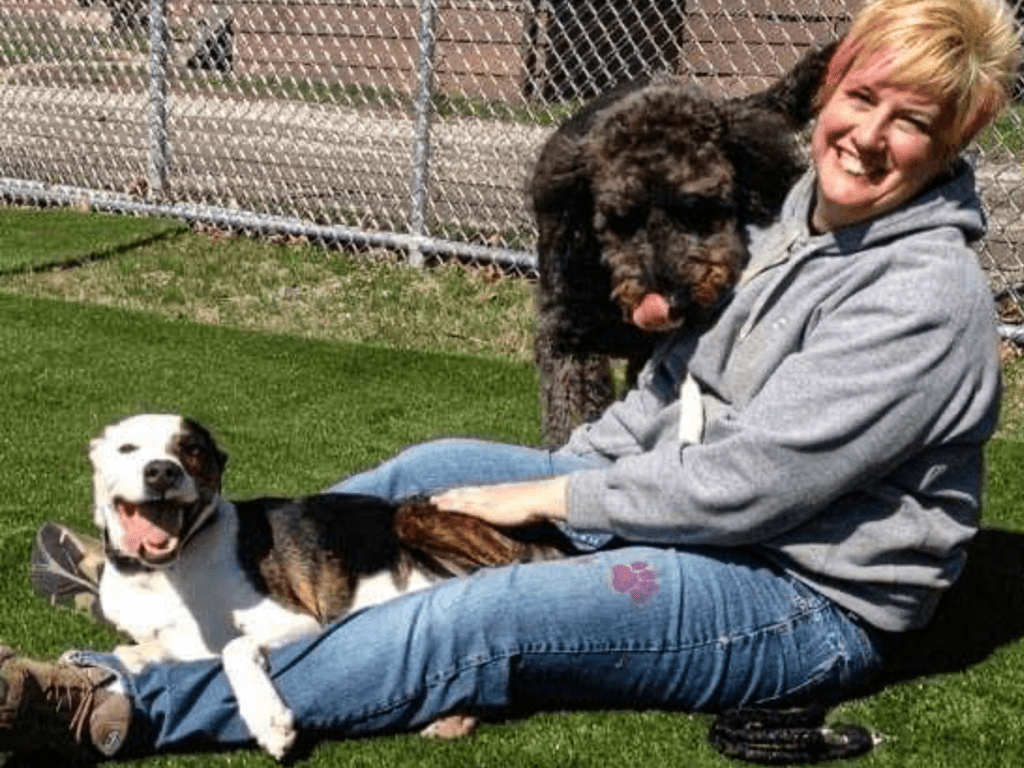 A woman and a big dog.