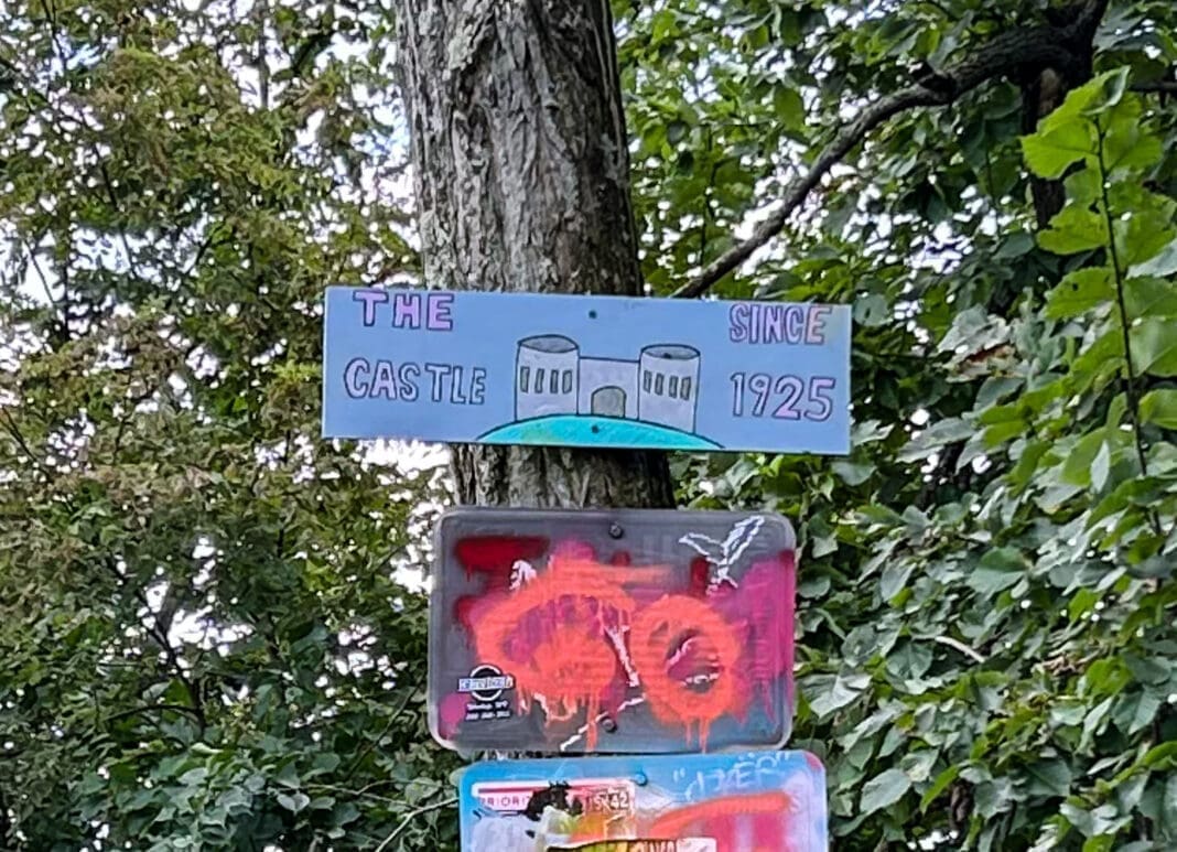 Signs on a tree.