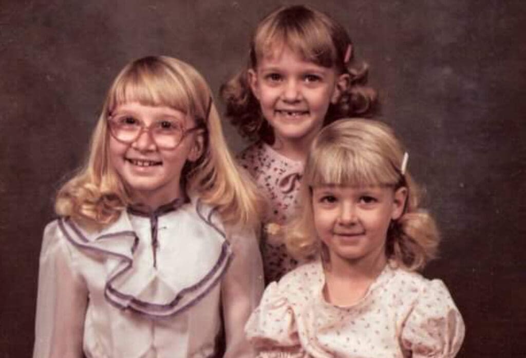 A photo of three girls.