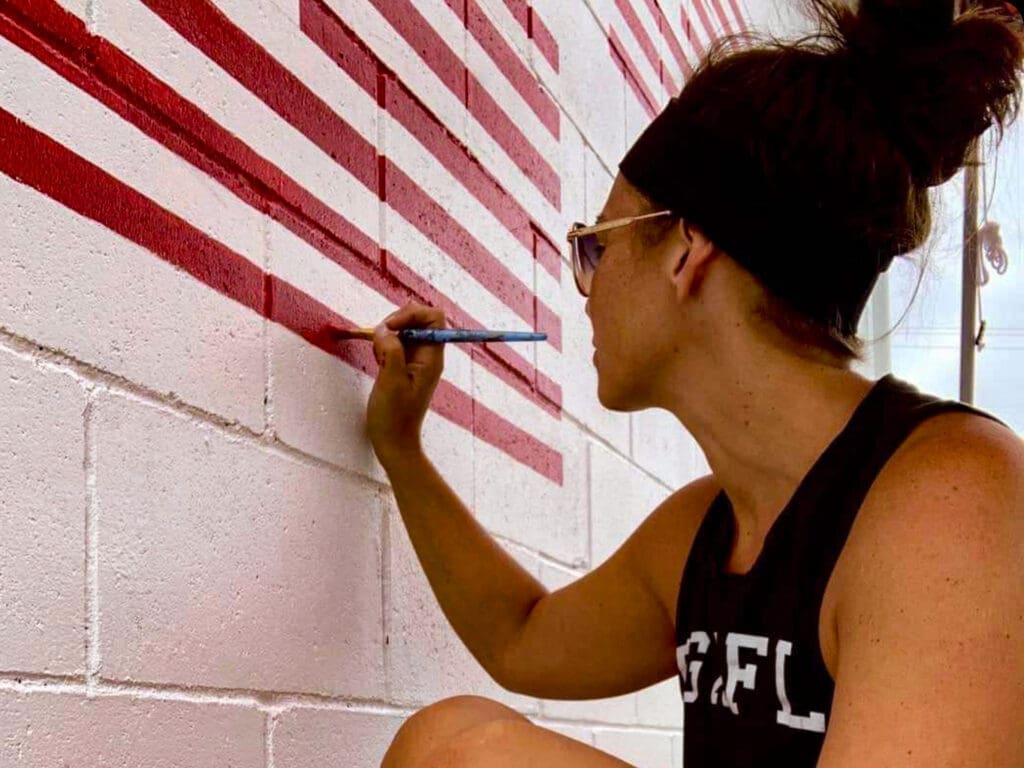 A woman painting.