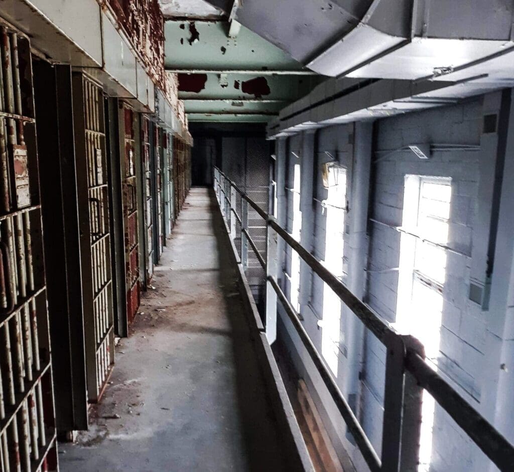 A walkway in a prison.