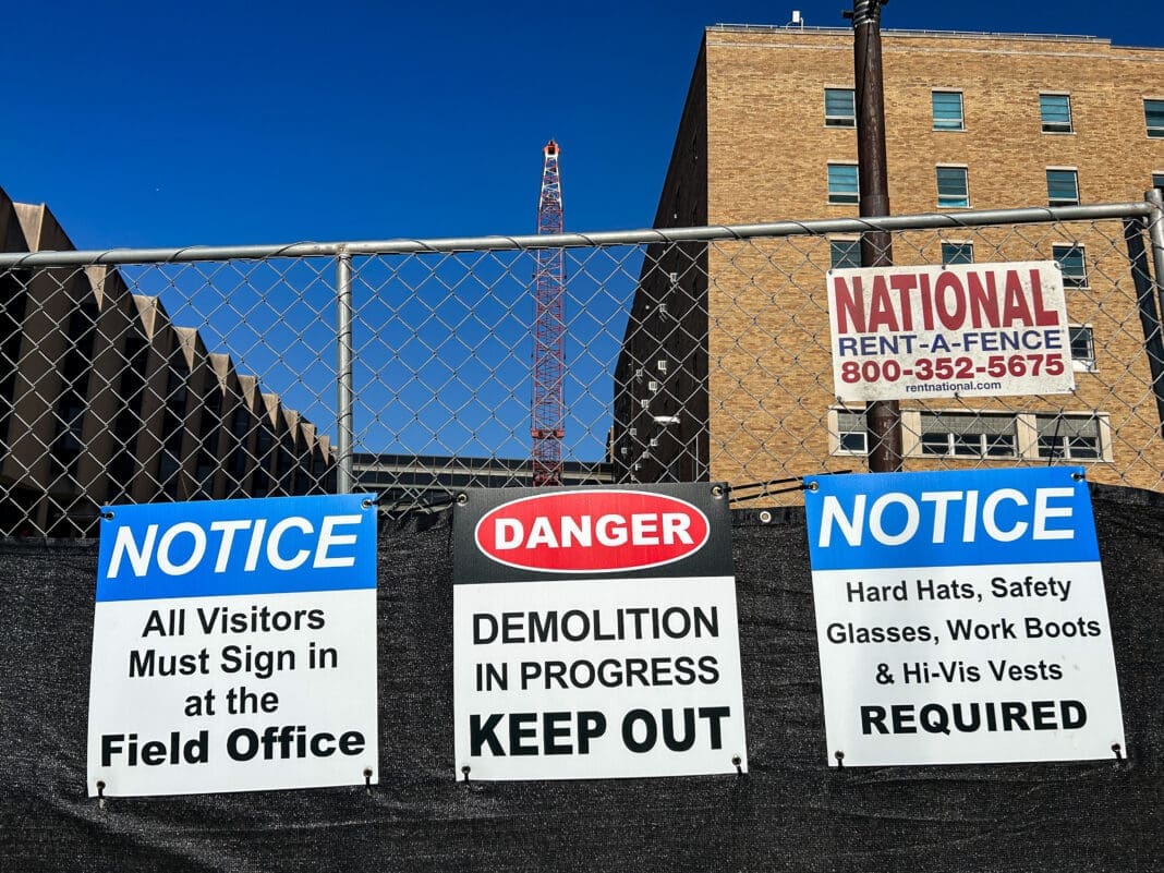 A fence and a crane.