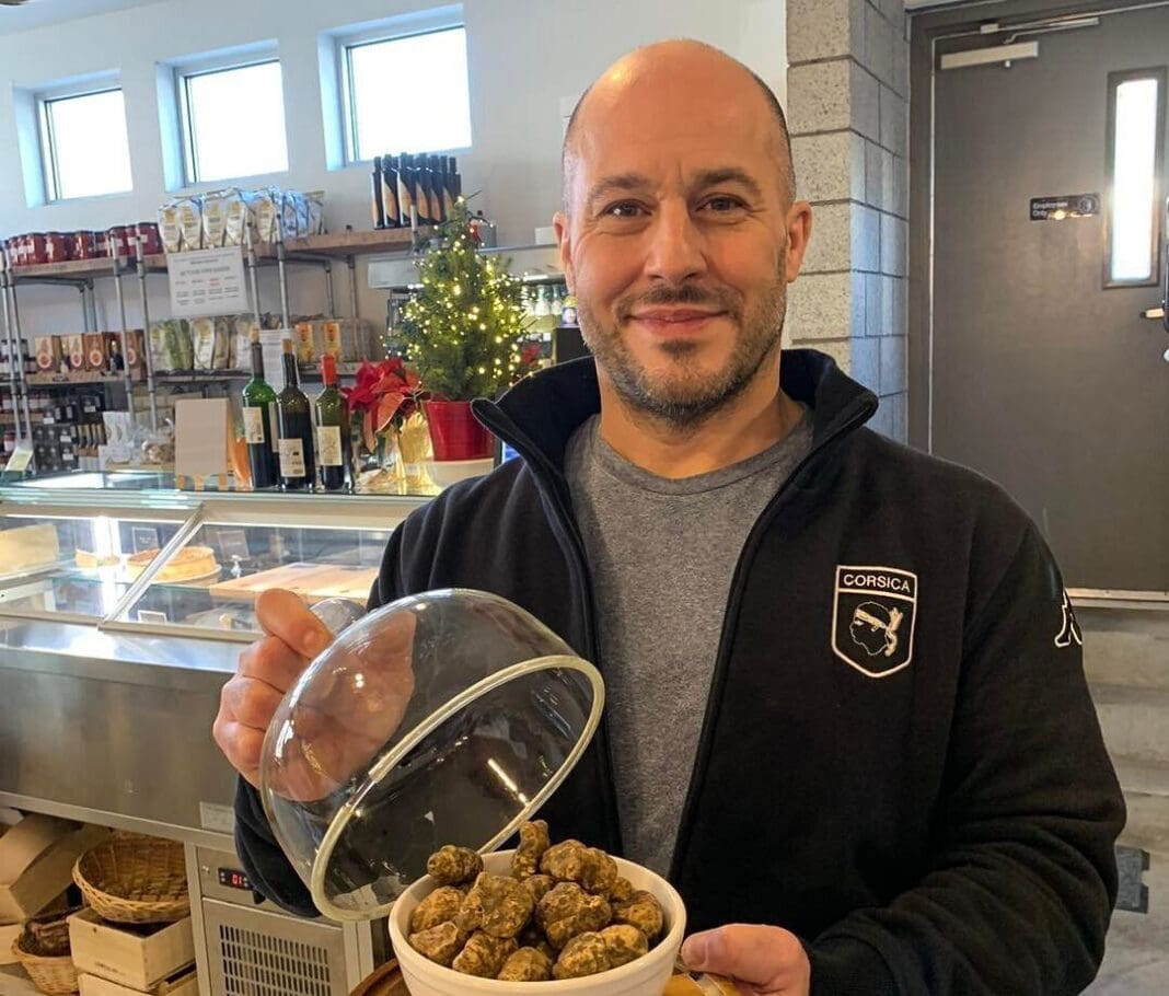 A man holding a tray.