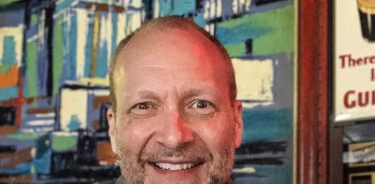 A man posing for a photo.