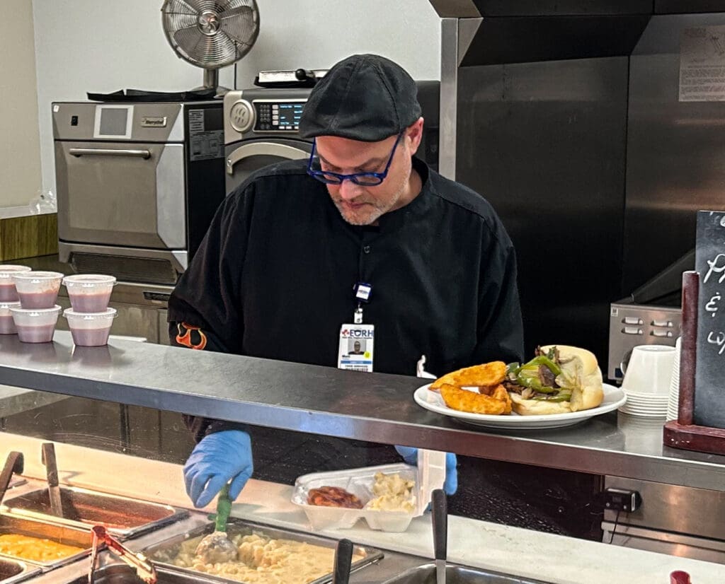 A man at a lunch counter.