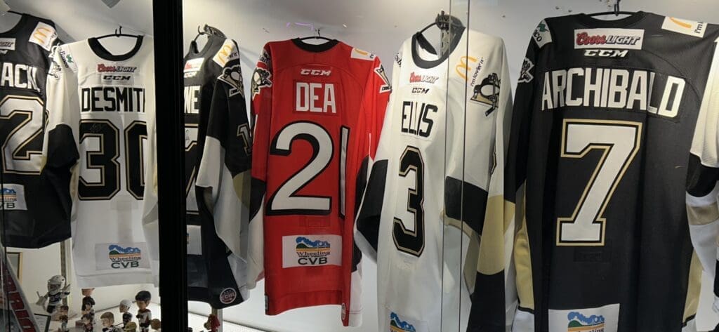 A trophy case of jerseys.