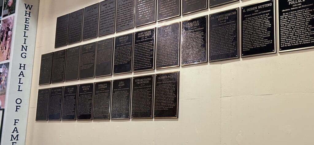 A number of plaques on the wall.