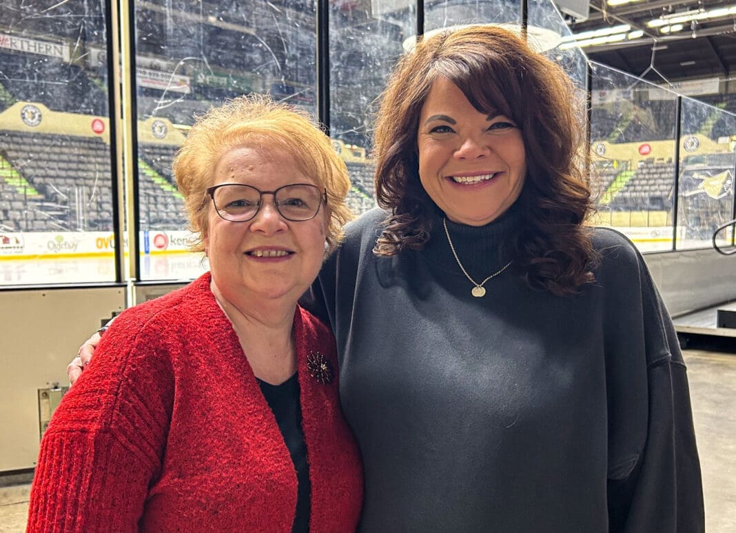 Two ladies at a rink.