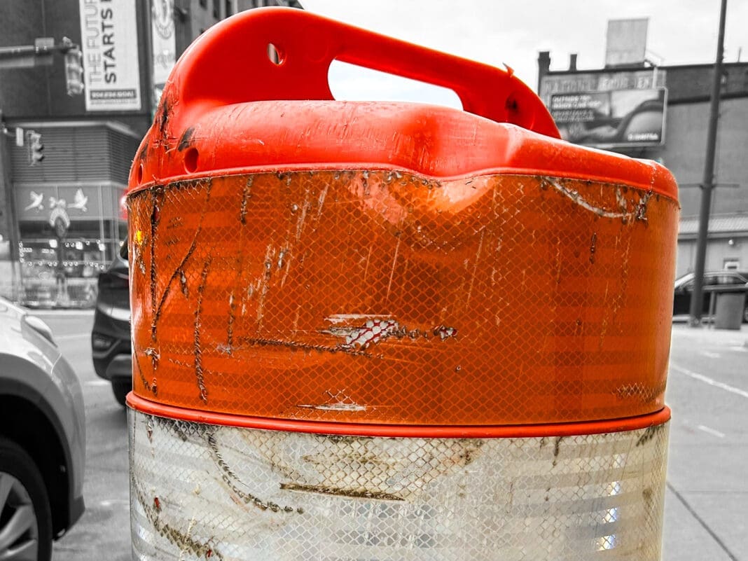 An orange barrel.