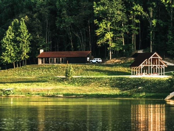 A house near a pond.