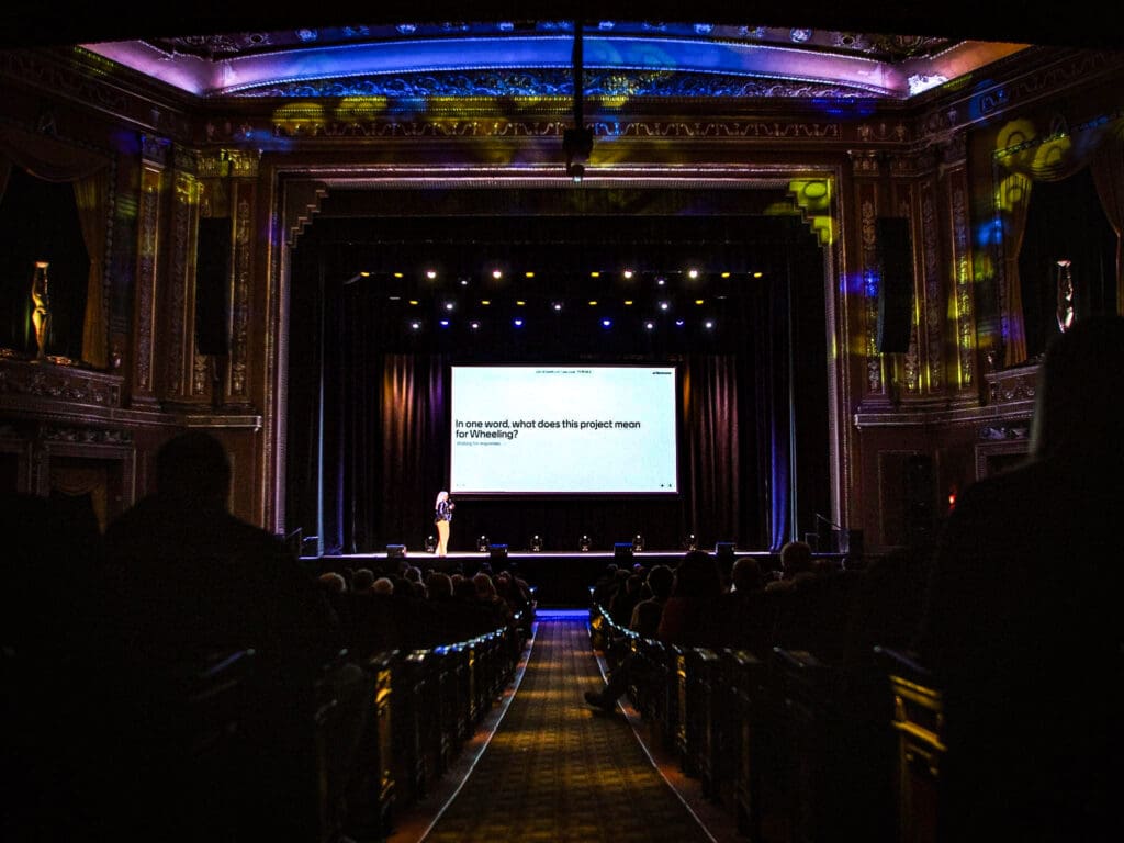 A stage with a sign.