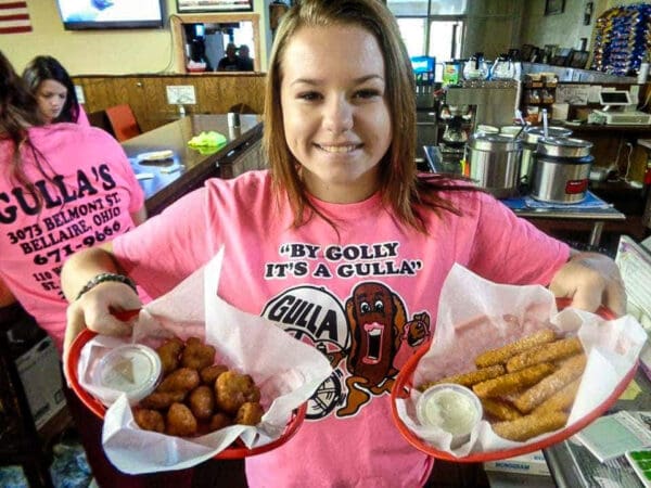 A girl with food.