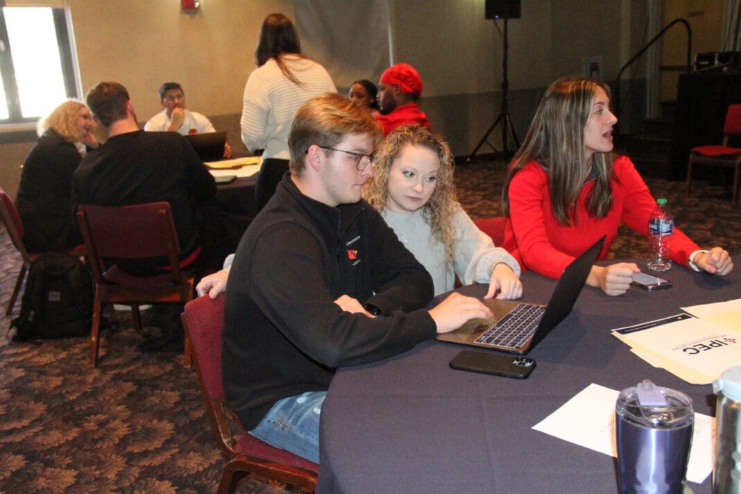 Students at a computer.