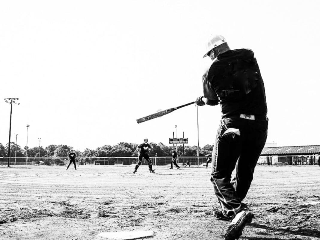 A batter taking a swing.