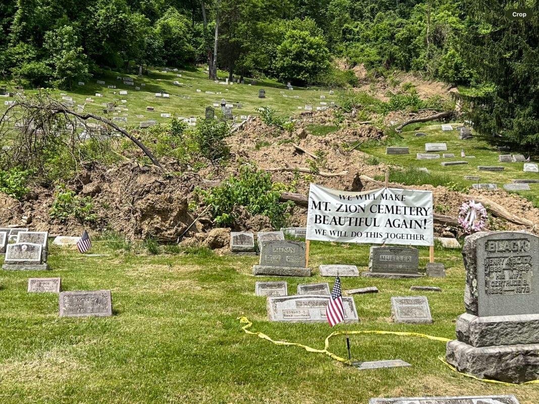 A cemetery with dried dirt.