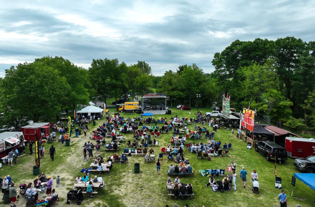 A large field with a stage.