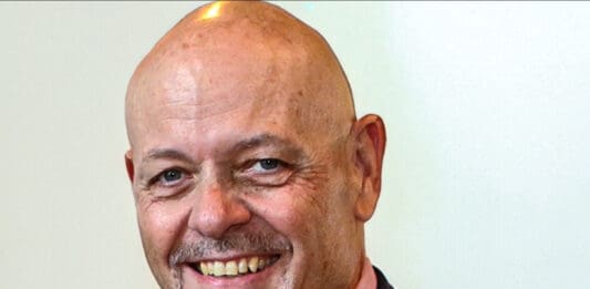 A smiling man.
