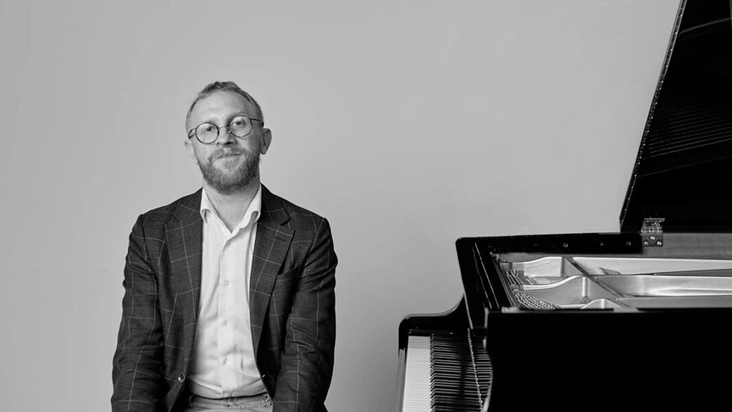 A man and a piano.