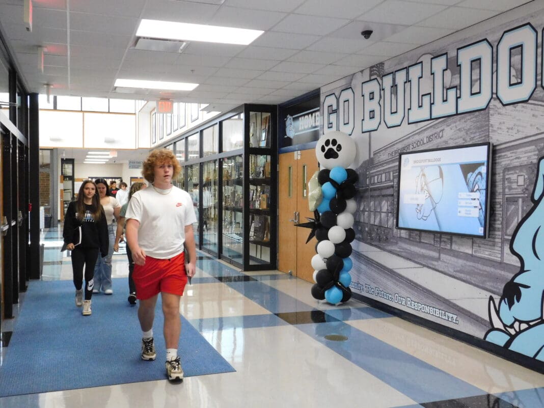 A student in a hallway.