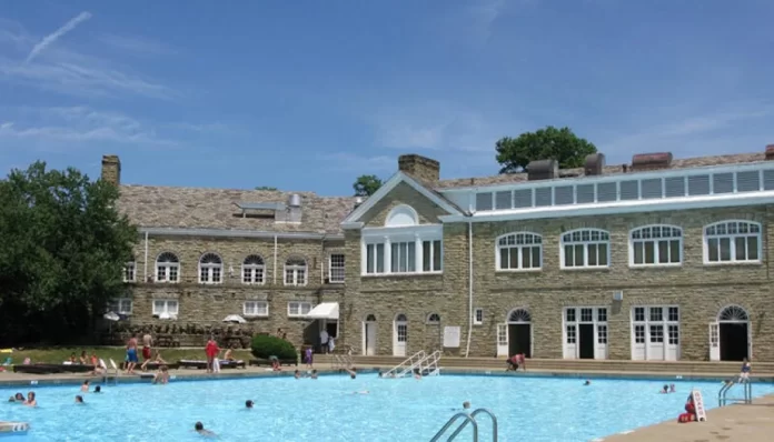 A big building and a pool.