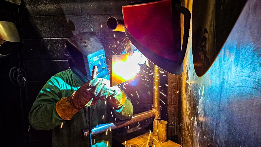 A student welding.