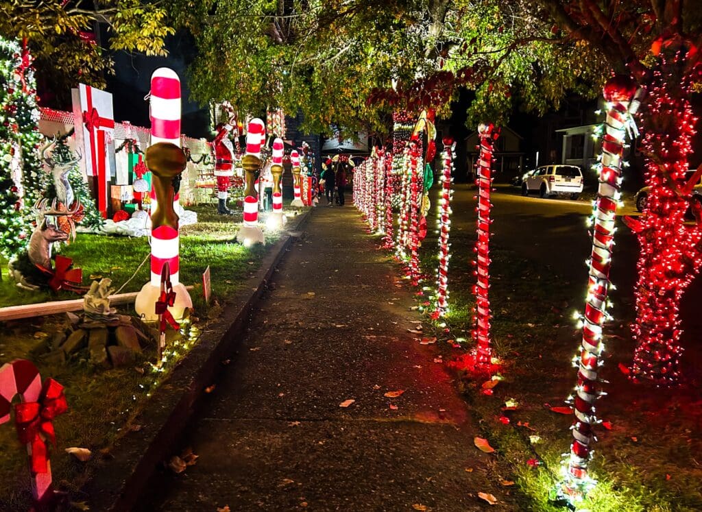 A sidewalk with lights.