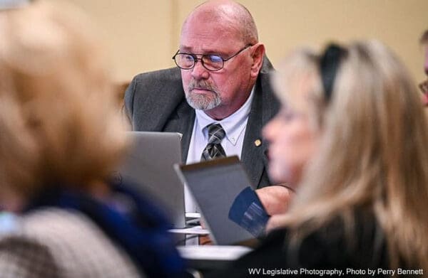 A man on a computer.