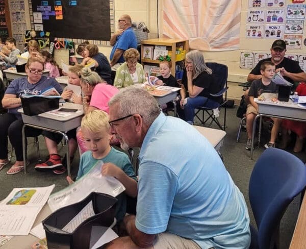 A classroom of kids and adults.