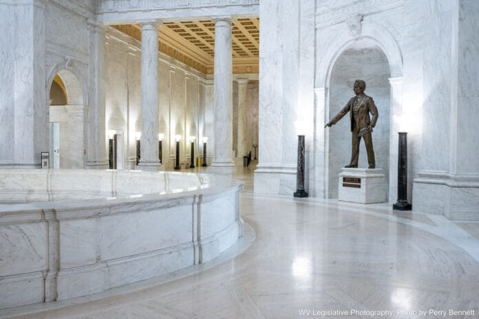 A hallway with a statue.