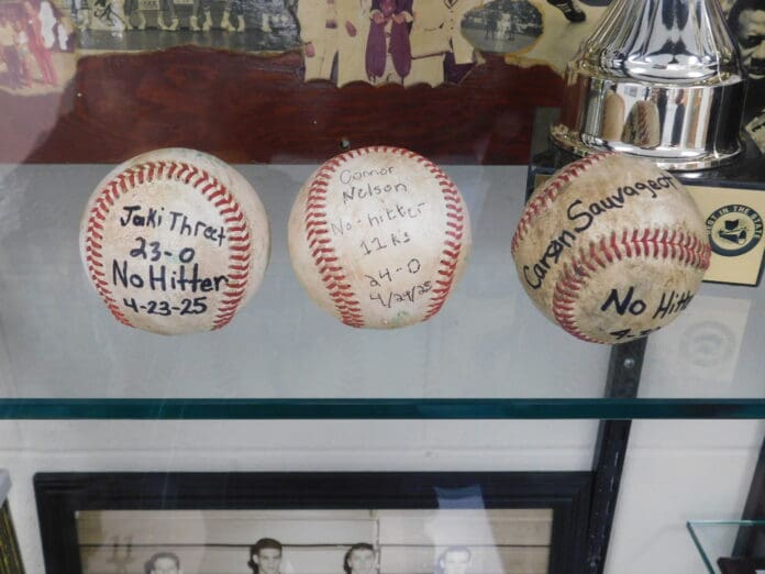 Three baseballs.