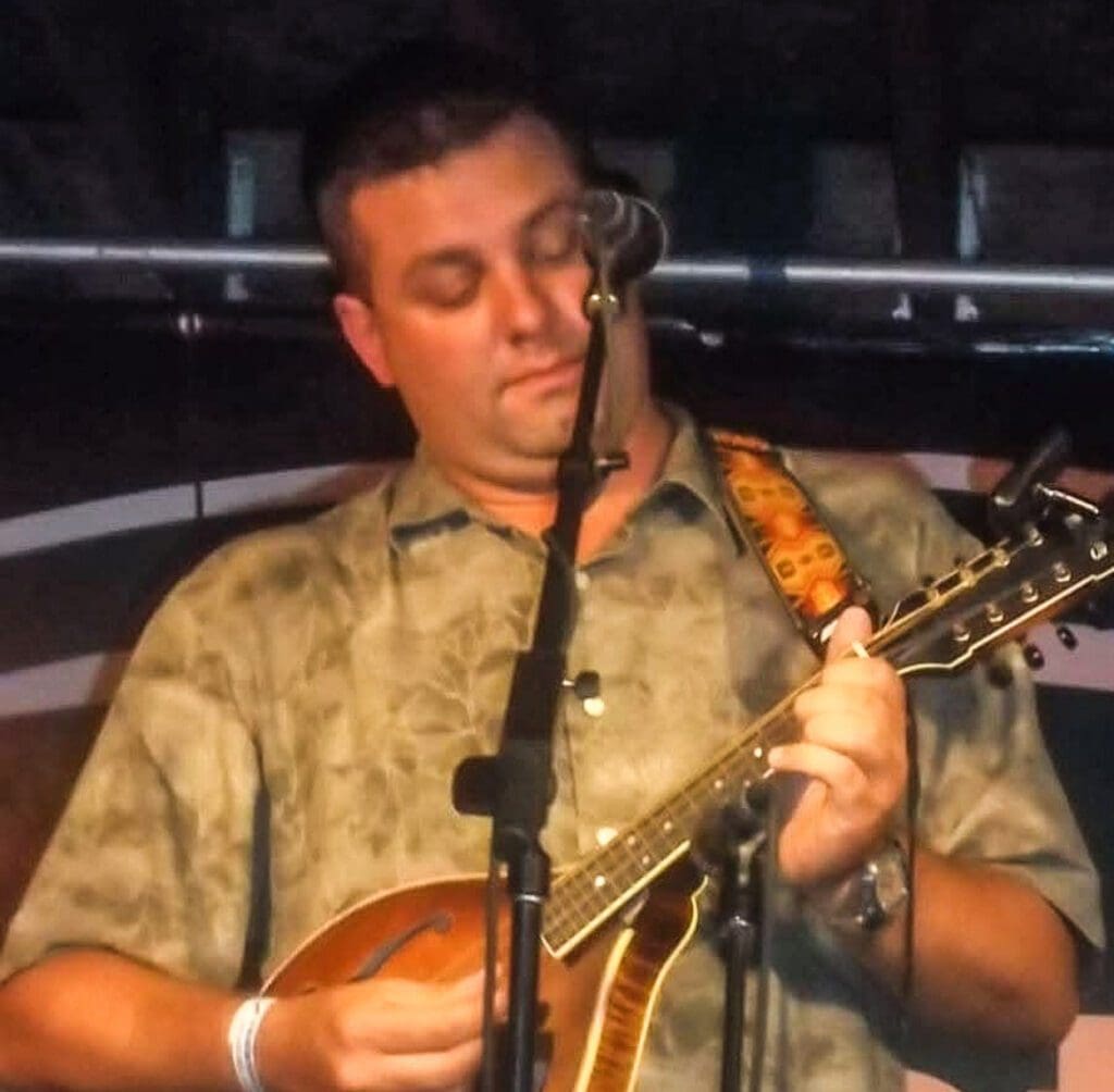 A man with a guitar.