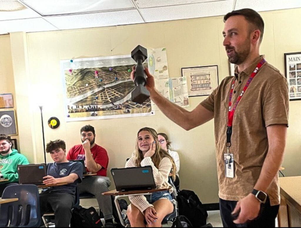 A man in a classroom.