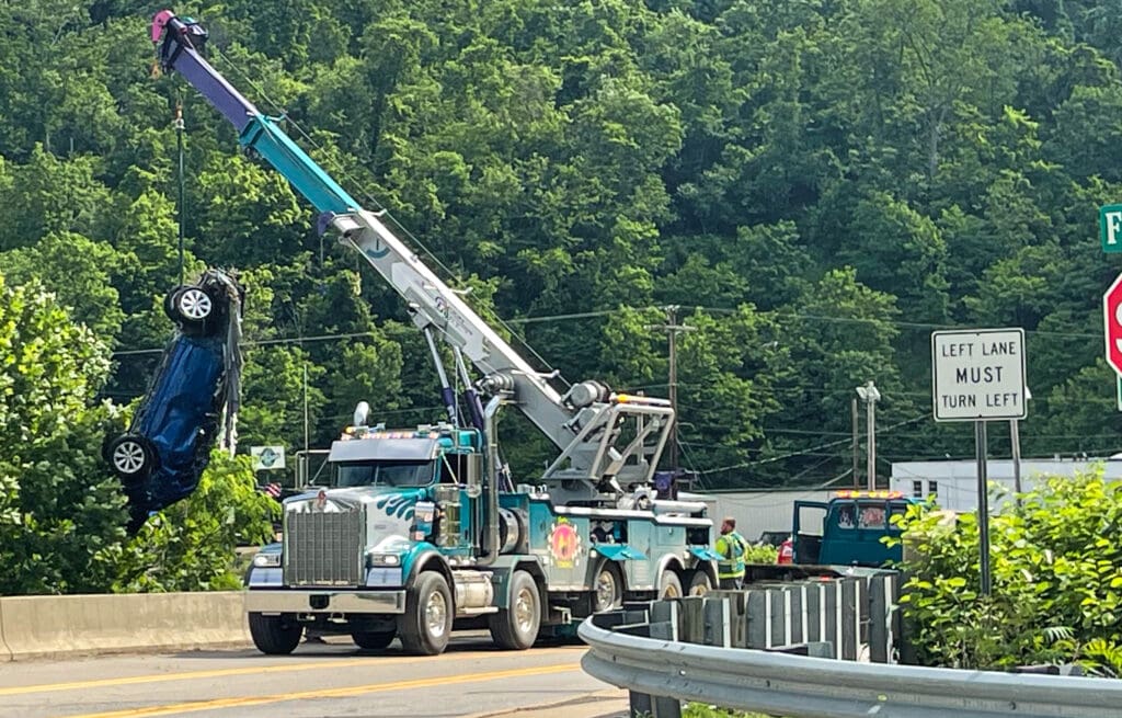 Car being lifted from Ohio County Floods by Erika Donaghy