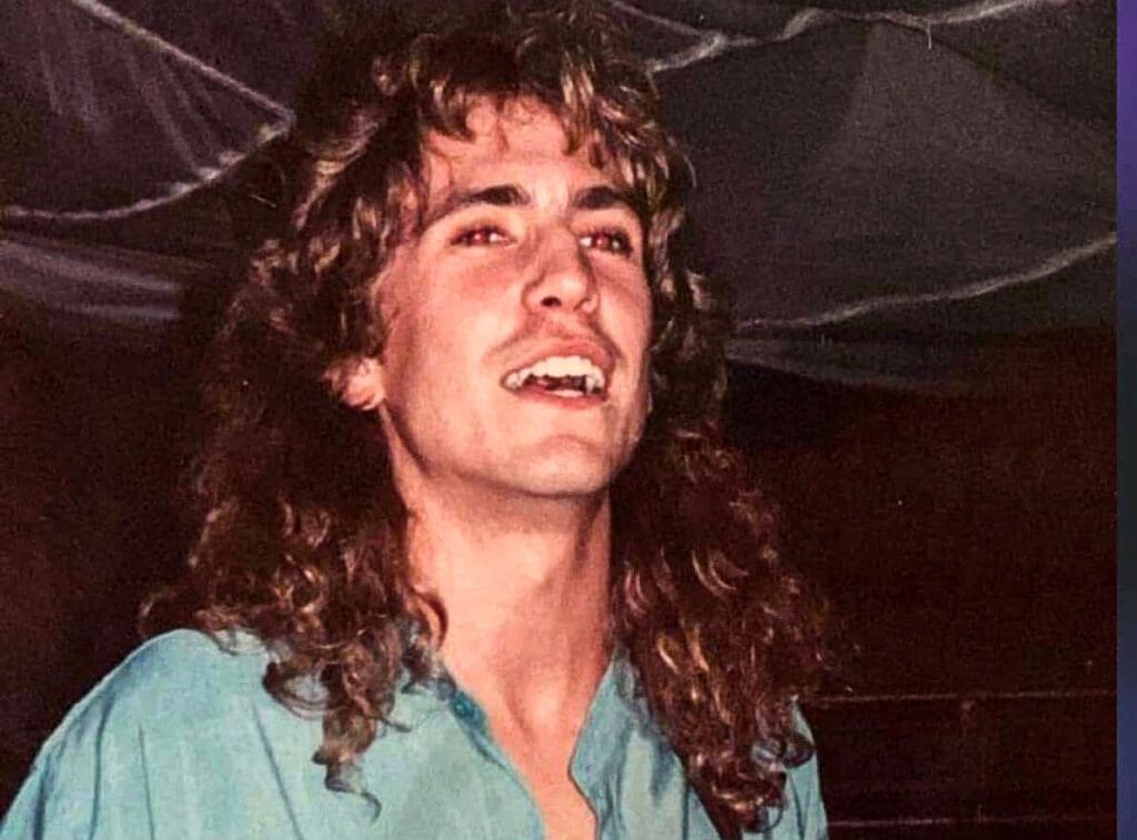 A man with long hair.