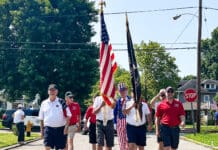 A group of men and women.